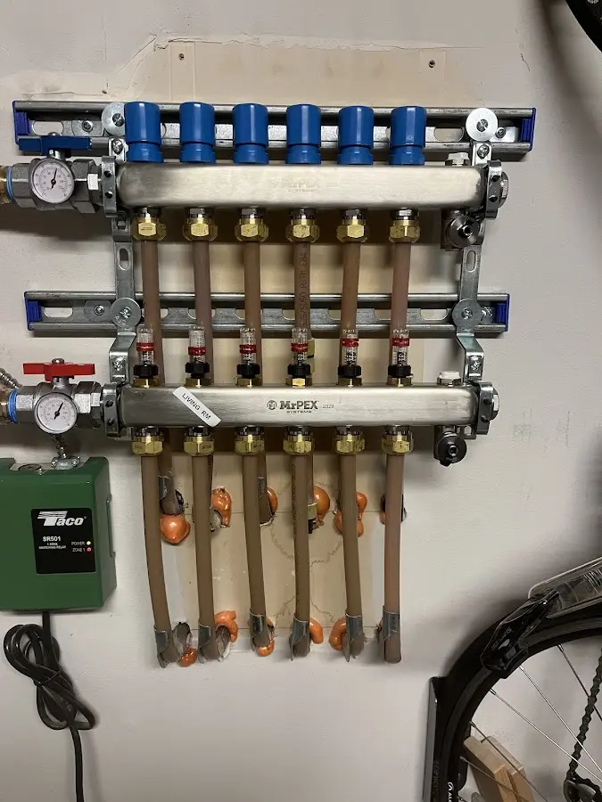 Plumber performing Water Heater Repair at a residential property in Manassas Park